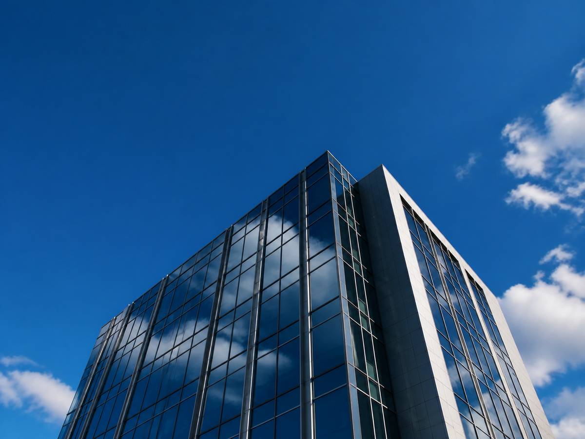 Commercial real estate video editing — a modern office building shot for an investor video